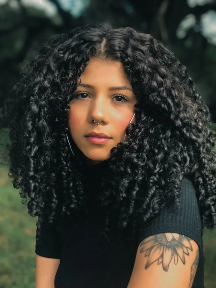 Dark curly hair, portrait